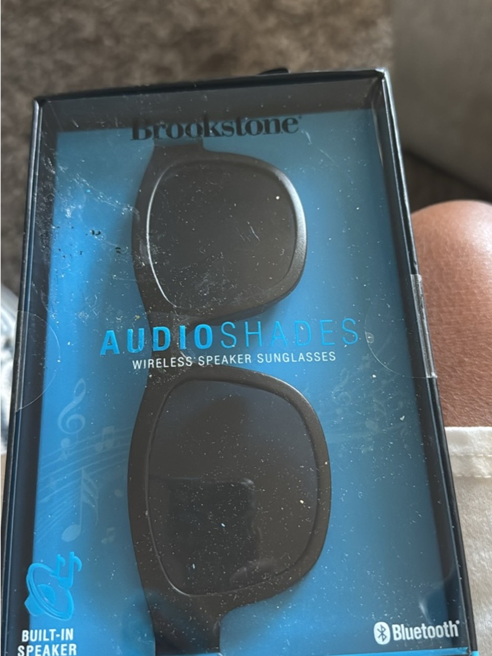 Brookstone Black Packaging with Teal Accents